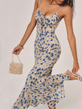 Vestido largo con estampado floral, nudo y bajo irregular