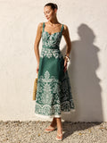 Vestido largo de tirantes con cinturón y estampado floral barroco