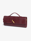 Clutch Bergamo en piel de cocodrilo